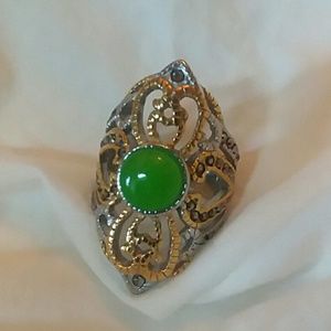 Large ring green stone with silver gold